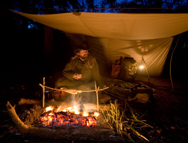 Providing shelter while still open to the night, a tarp is well suited to bushcraft use. -  2017 - Gary Waidson - Ravenlore